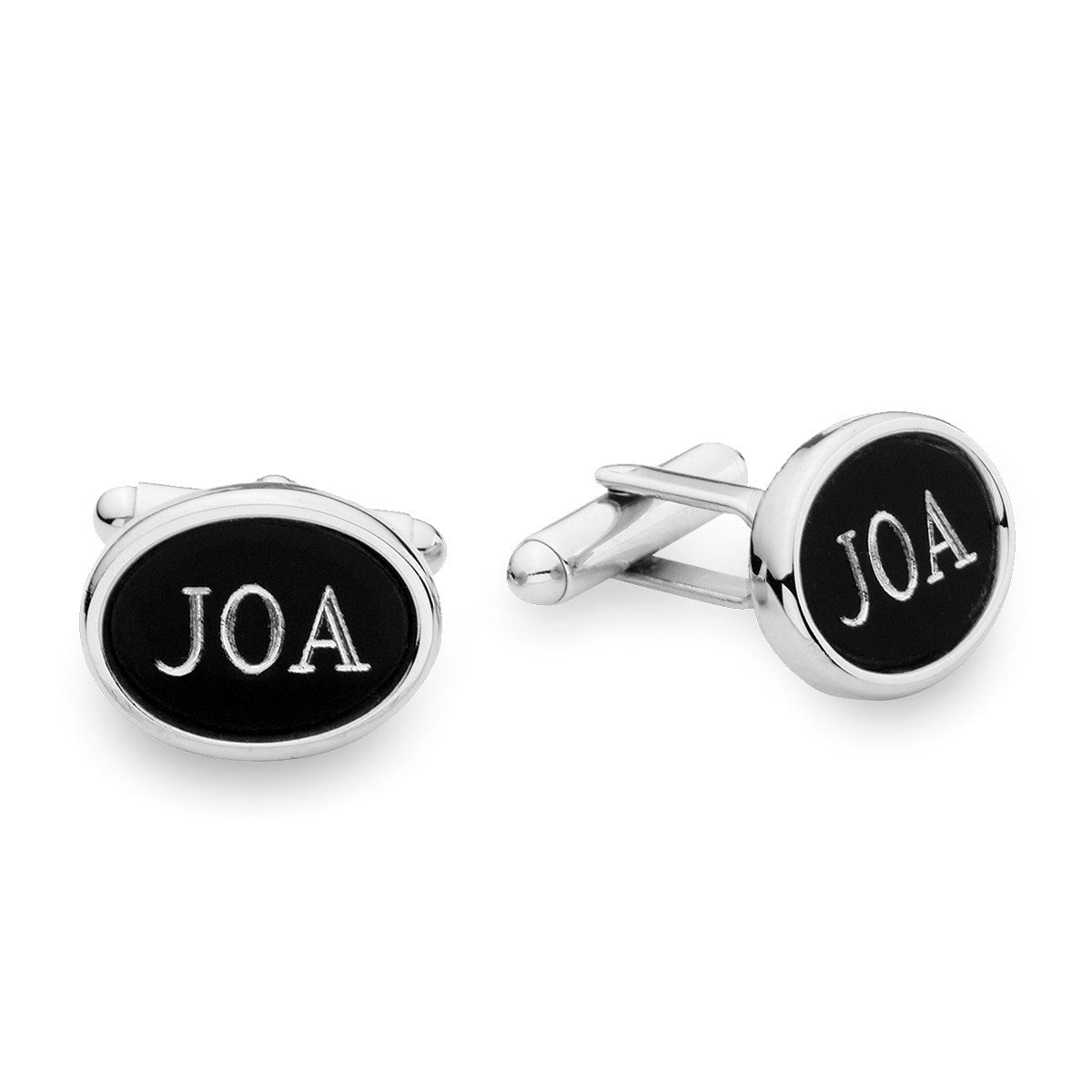 A matte black oval cufflinks displayed on a neutral white background.