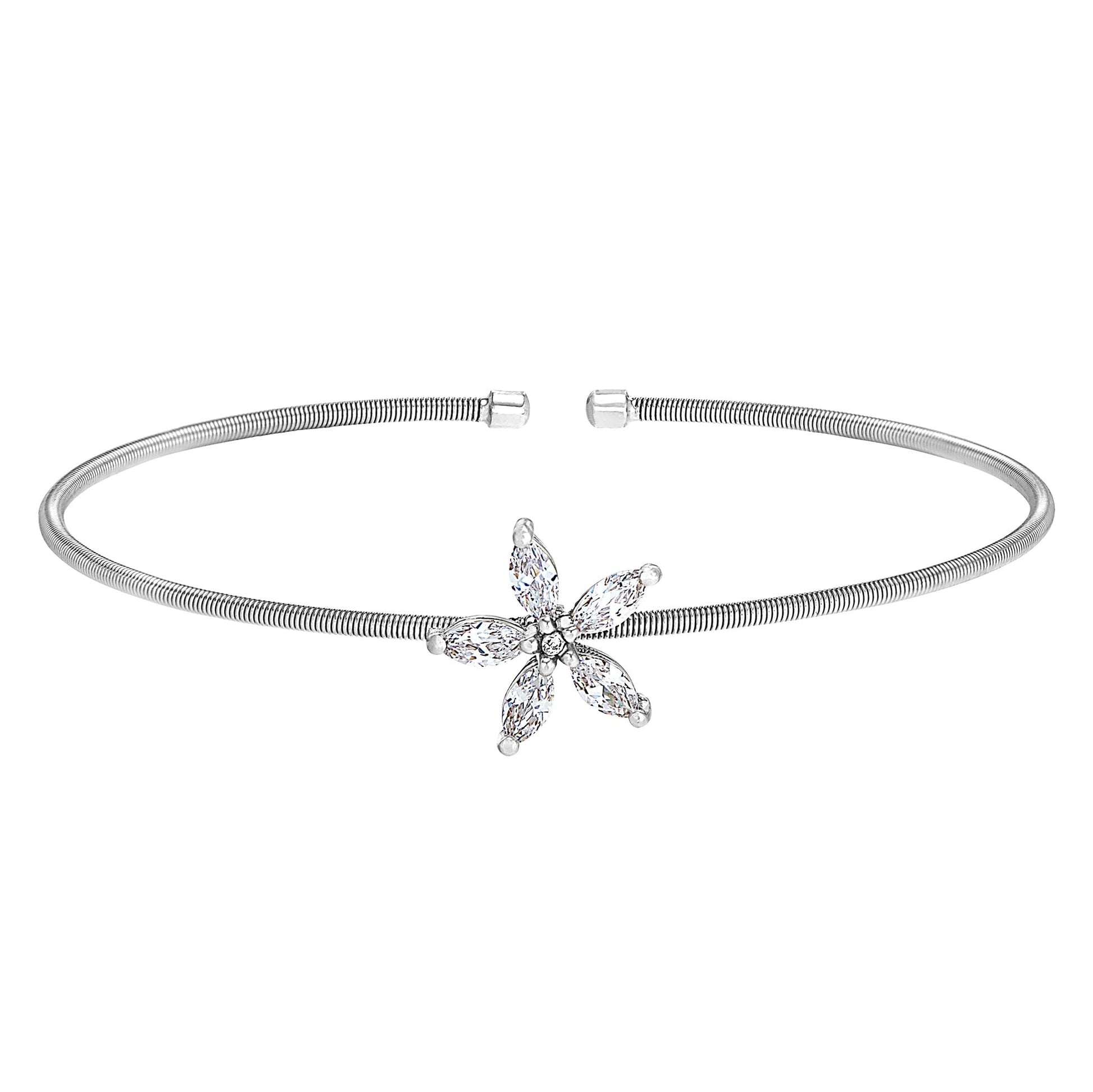 A cable flower bracelet with simulated diamonds displayed on a neutral white background.